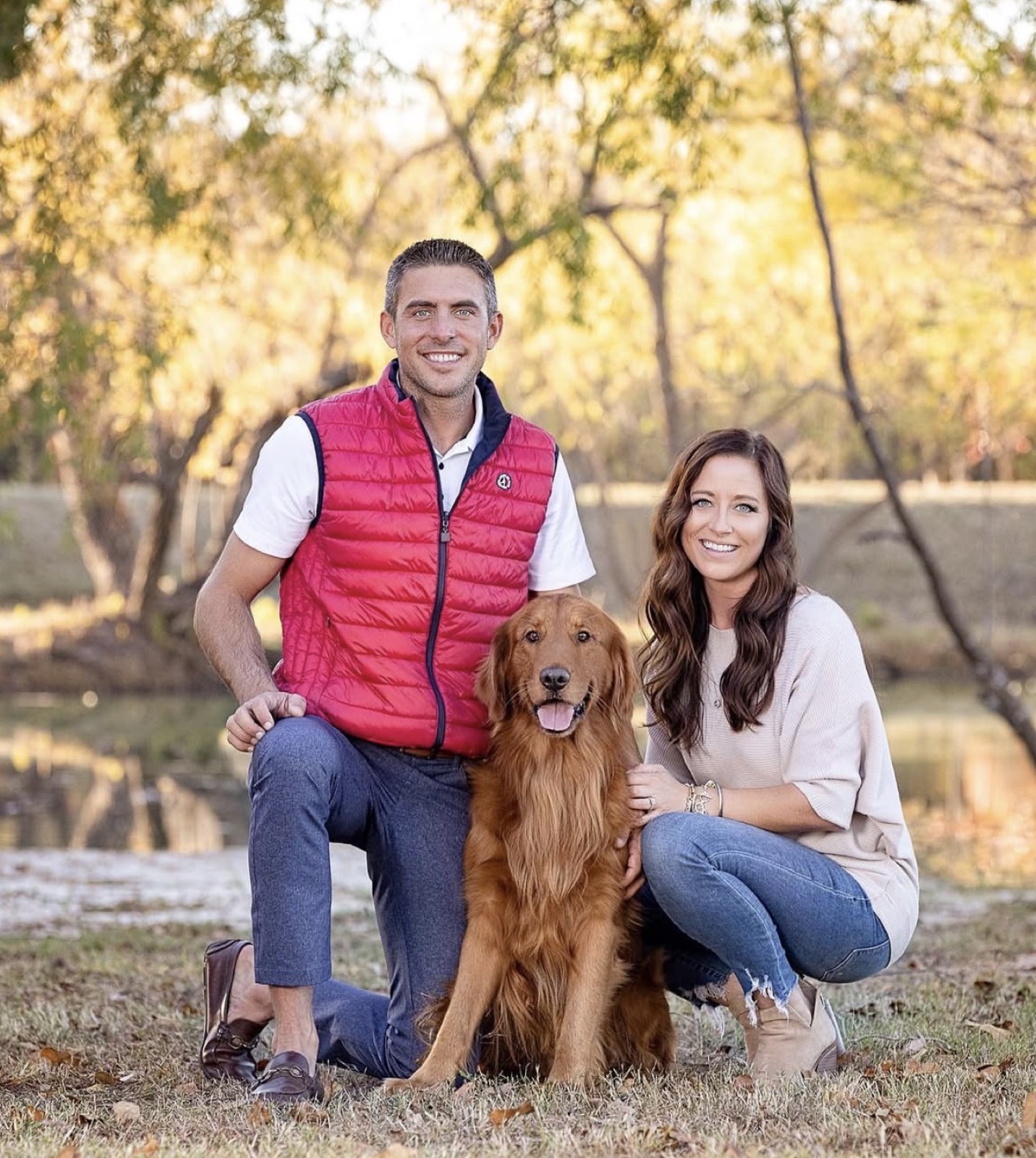 Nathan and his wife with their Golden Retriever at home
